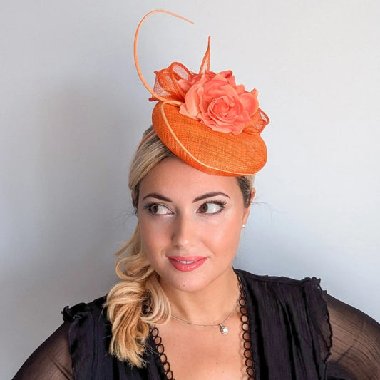 Bright orange coral flower fascinator hat - House of Hats