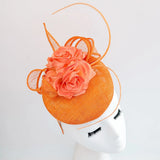 Bright orange coral flower fascinator hat - House of Hats