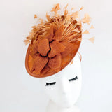 Burnt orange feather disc fascinator hat - House of Hats