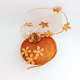 Burnt orange flower fascinator hat - House of Hats