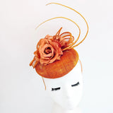 Burnt orange flower fascinator hat - House of Hats