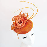 Burnt orange flower fascinator hat - House of Hats