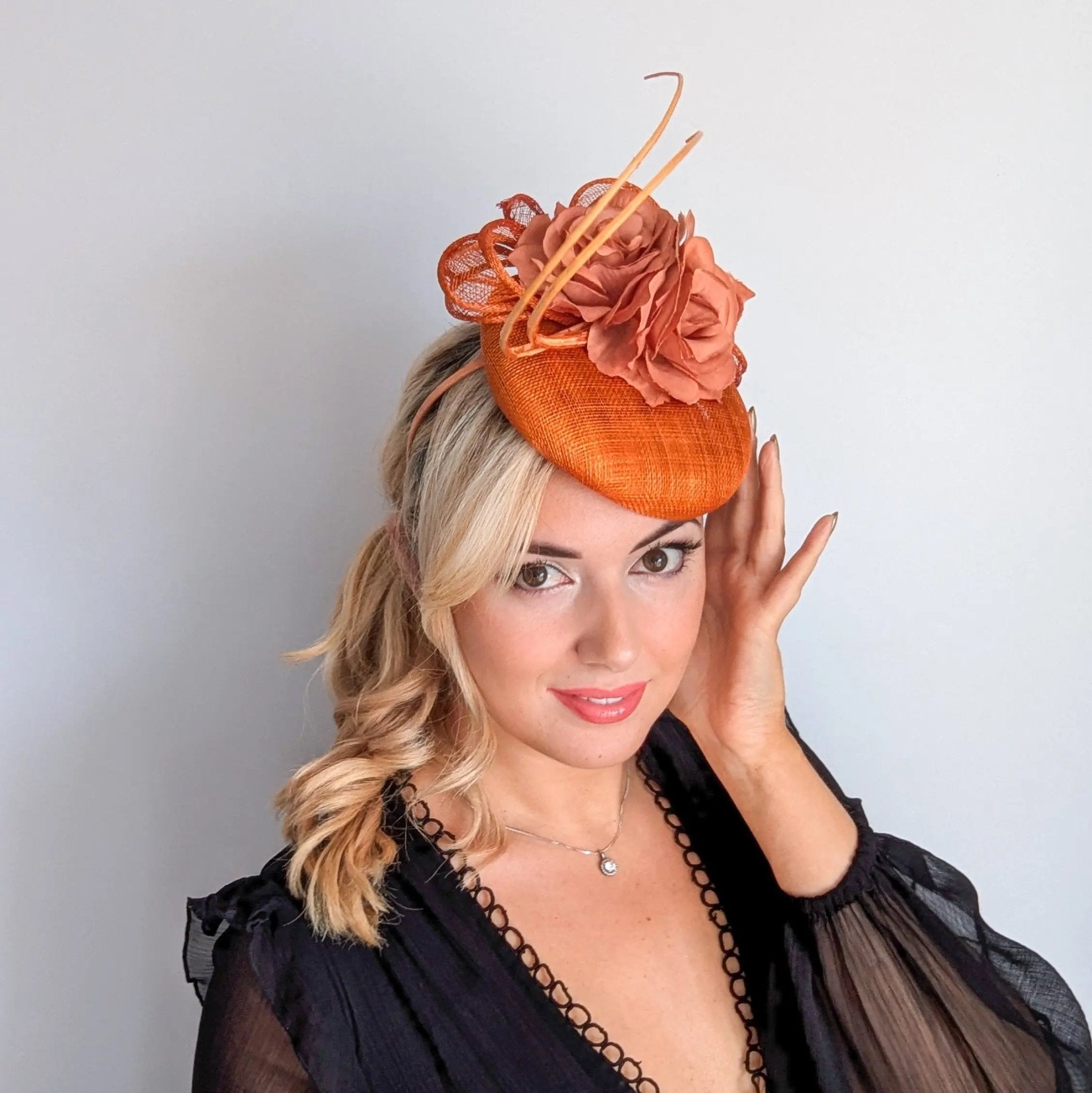 Burnt orange flower fascinator hat - House of Hats