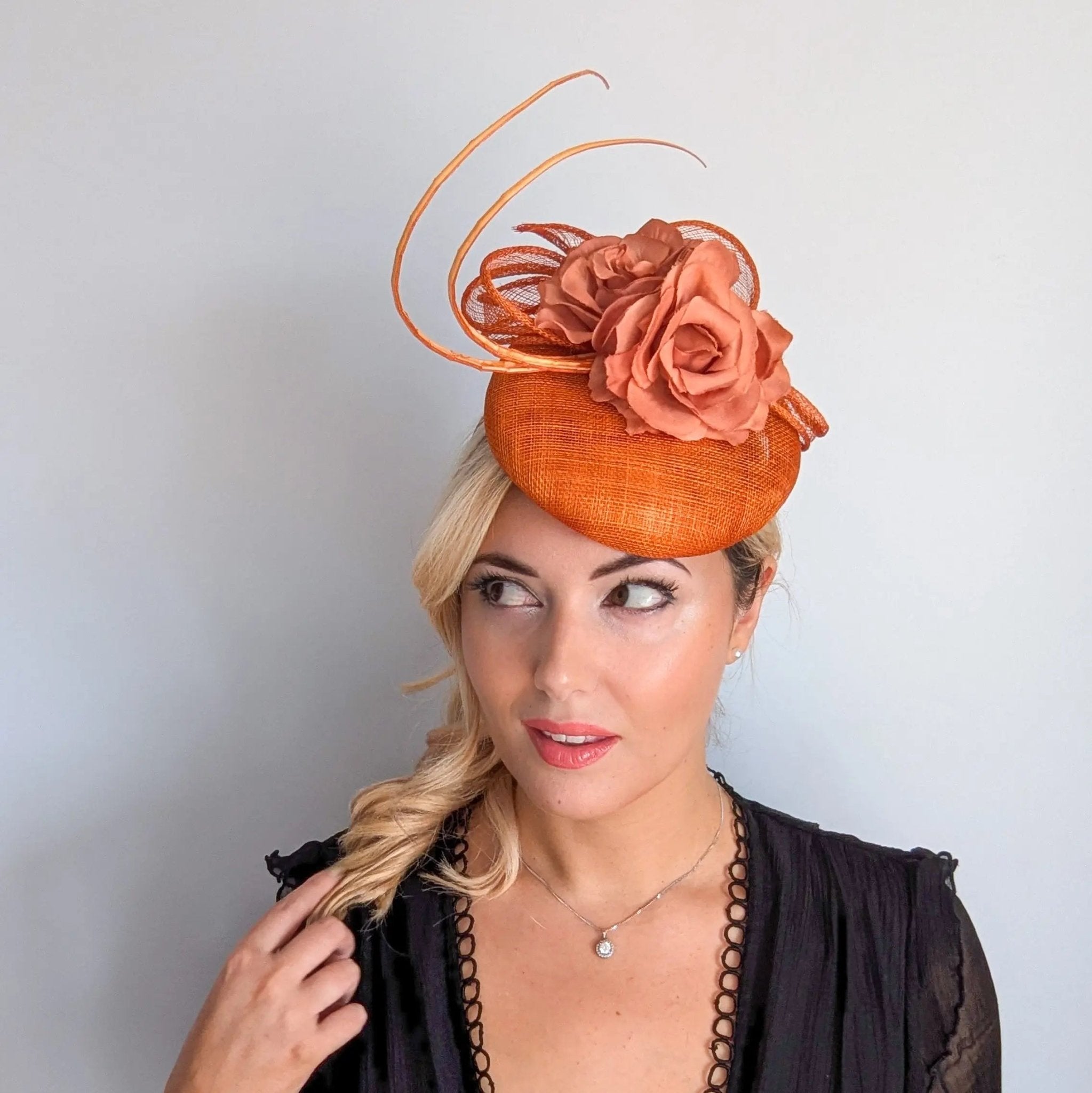 Burnt orange flower fascinator hat - House of Hats