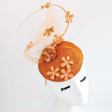 Burnt orange flower fascinator hat - House of Hats