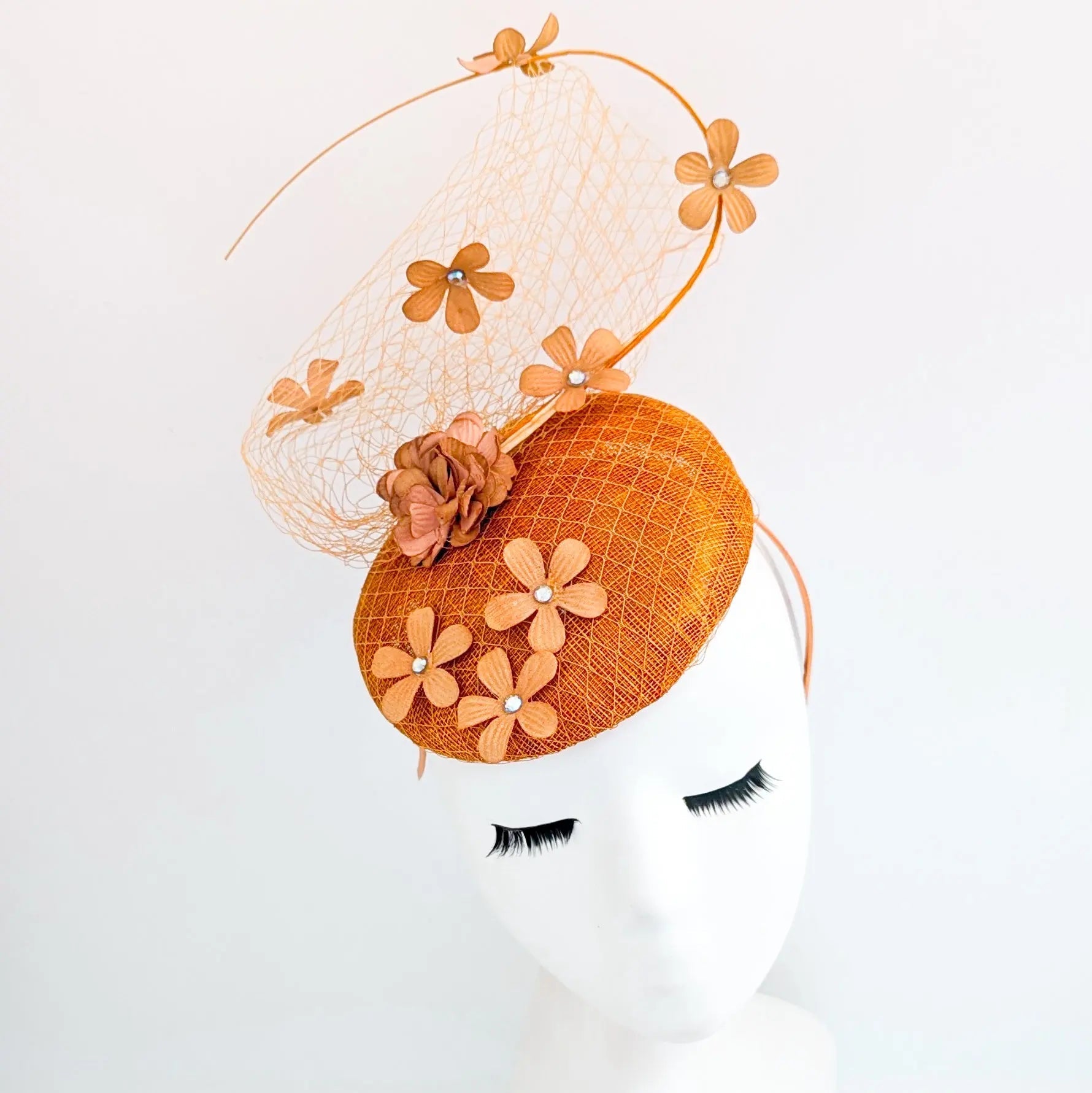 Burnt orange flower fascinator hat - House of Hats