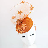 Burnt orange flower fascinator hat - House of Hats