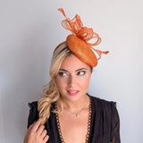 Burnt tangerine orange fascinator hat - House of Hats
