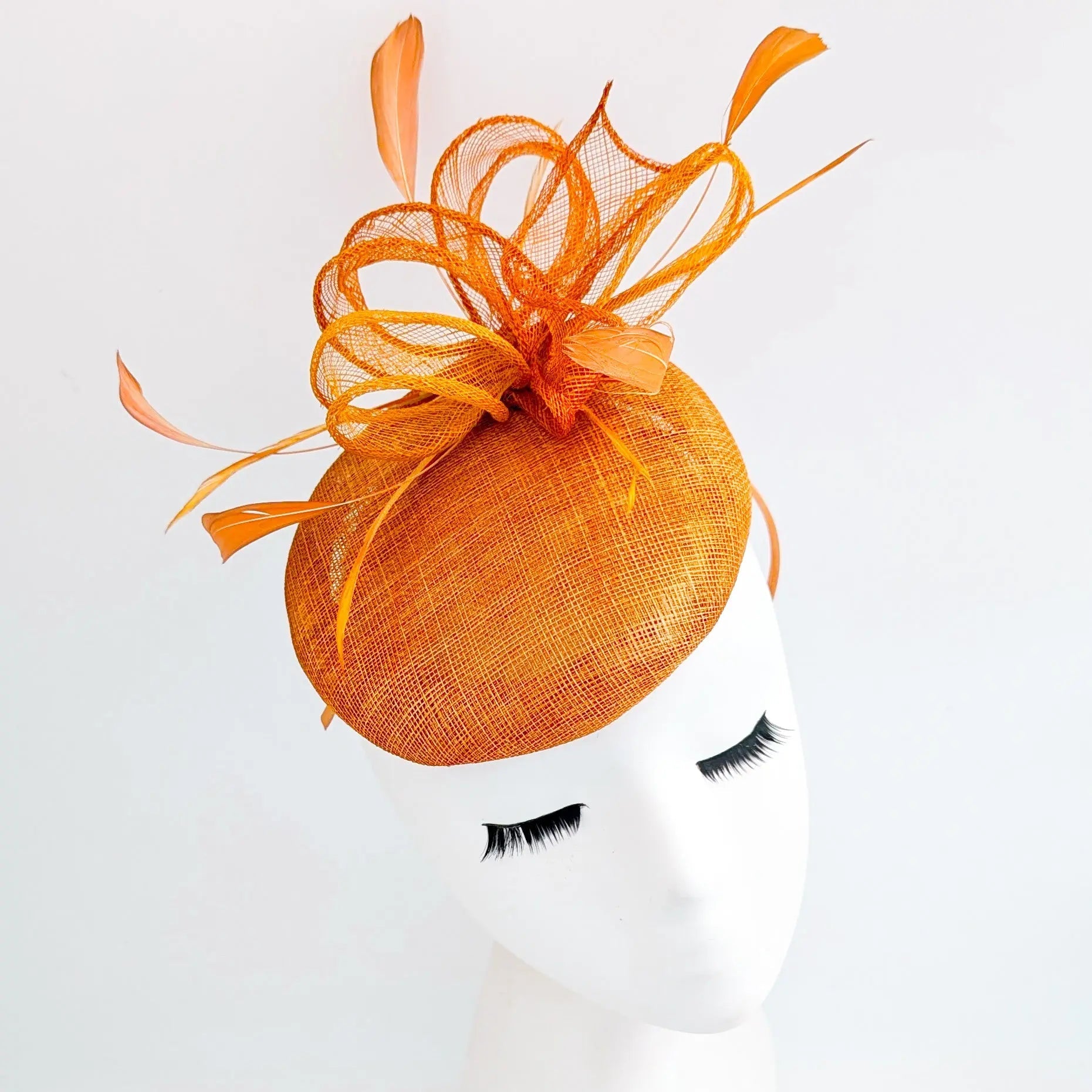 Burnt tangerine orange fascinator hat - House of Hats