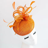Burnt tangerine orange fascinator hat - House of Hats