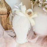 Cream feather fascinator hat - House of Hats