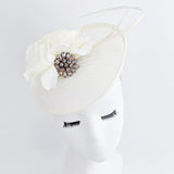 Cream flower disc saucer fascinator hat - House of Hats