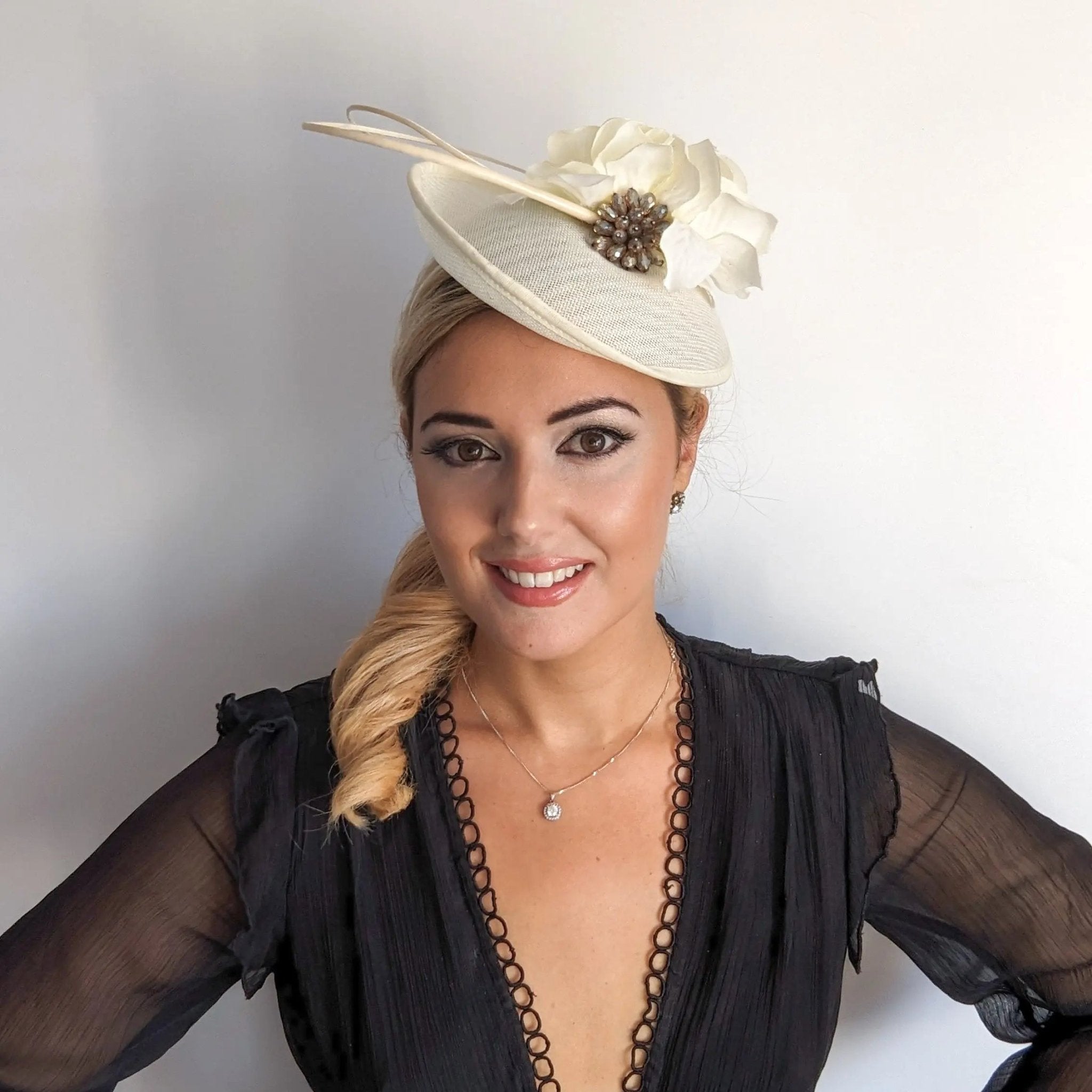 Cream flower disc saucer fascinator hat - House of Hats