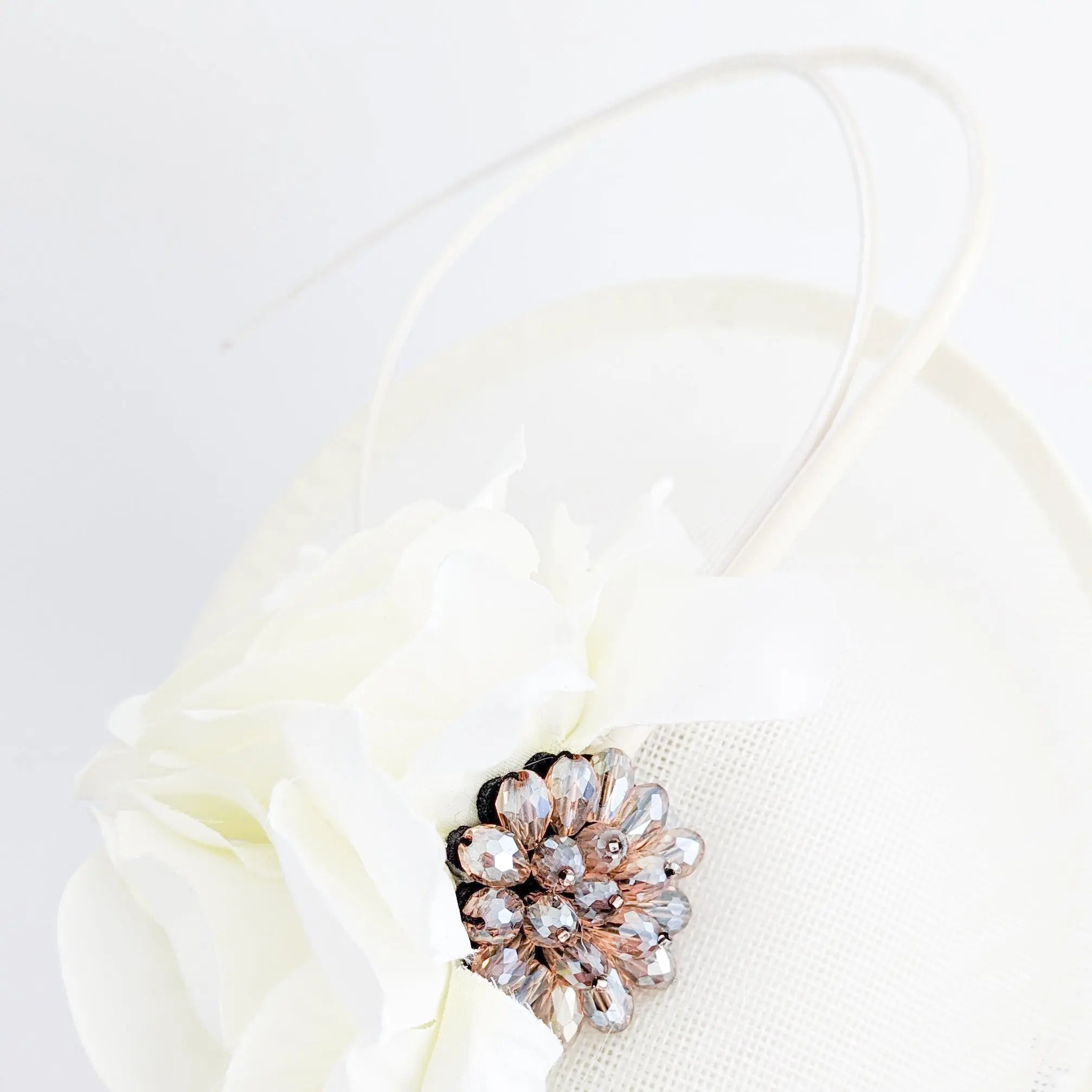 Cream flower disc saucer fascinator hat - House of Hats
