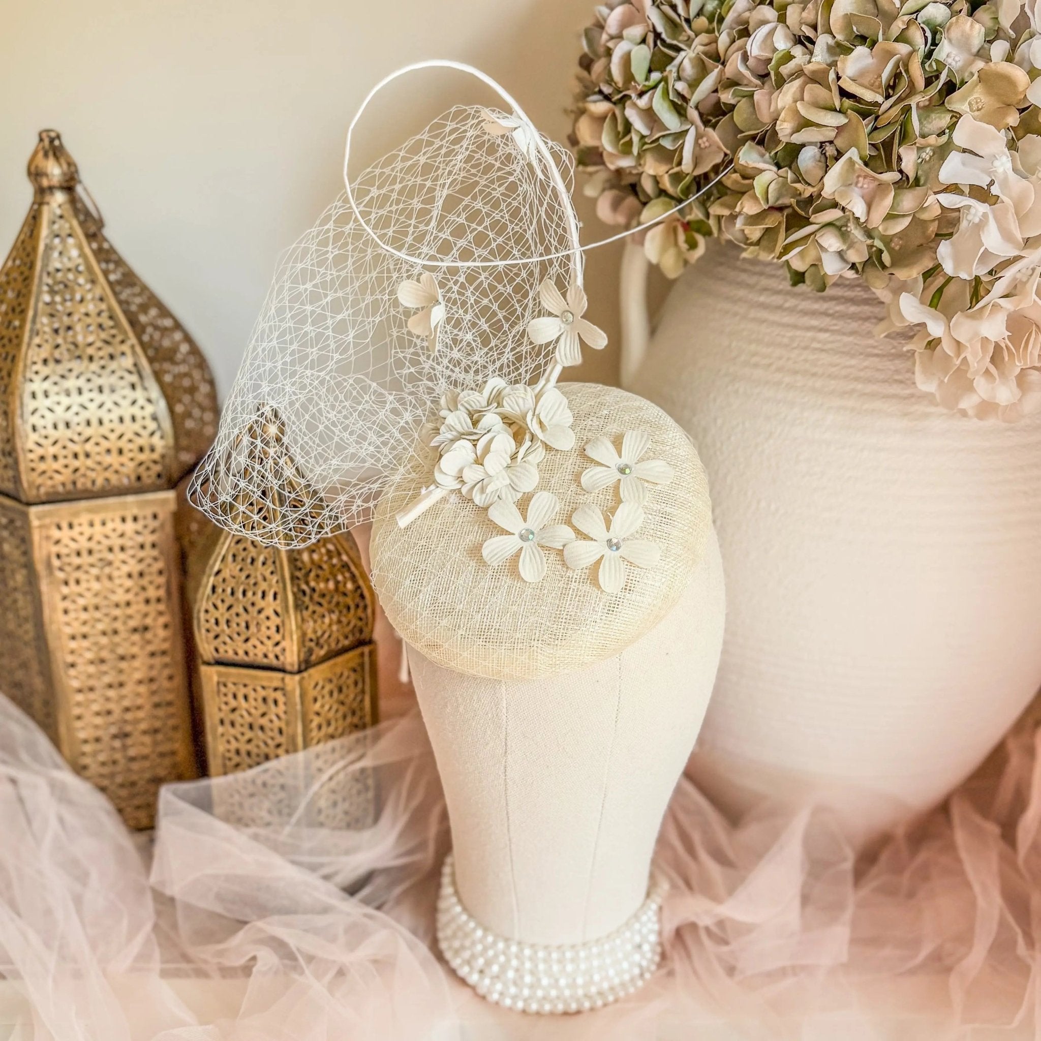 Cream flower fascinator hat - House of Hats