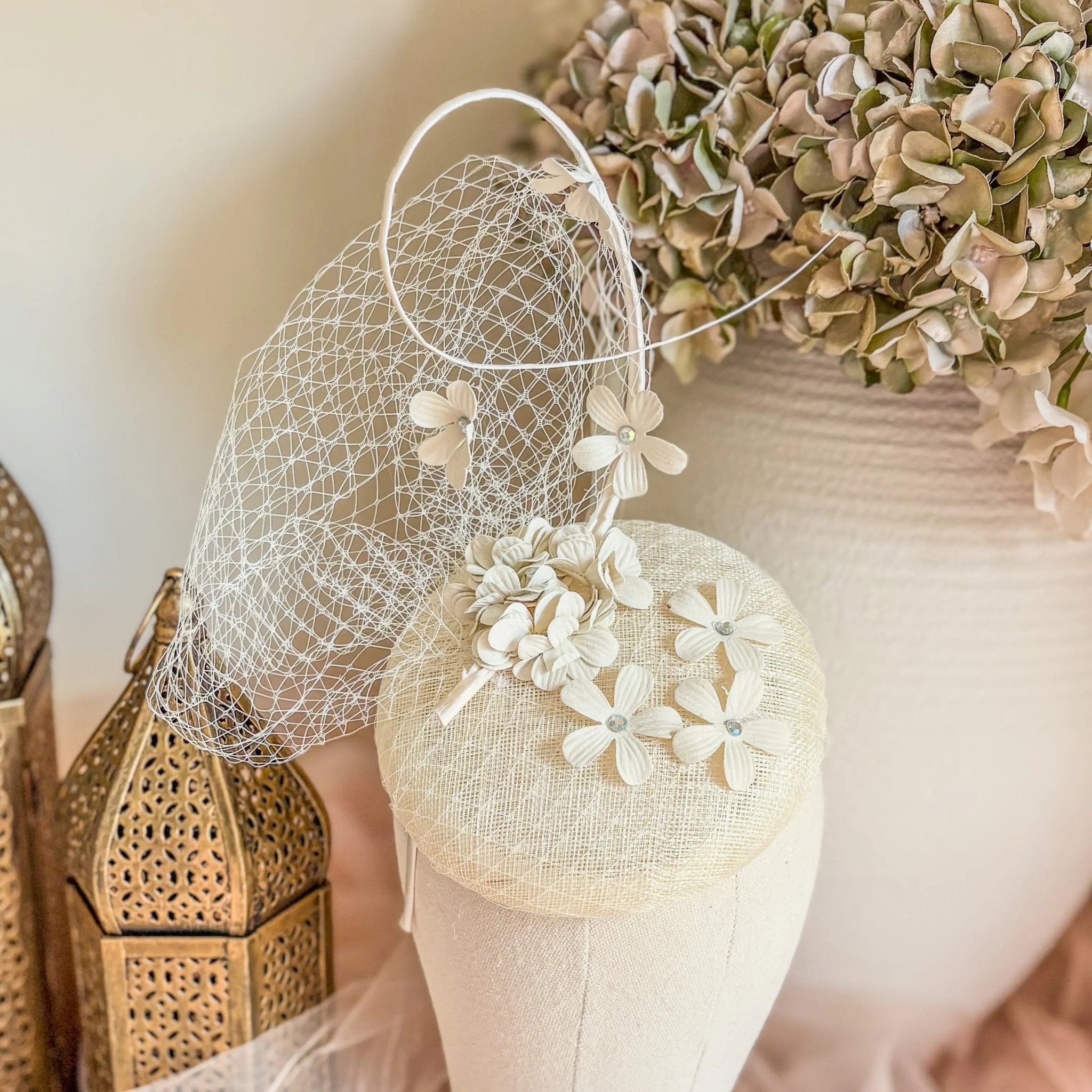 Cream flower fascinator hat - House of Hats
