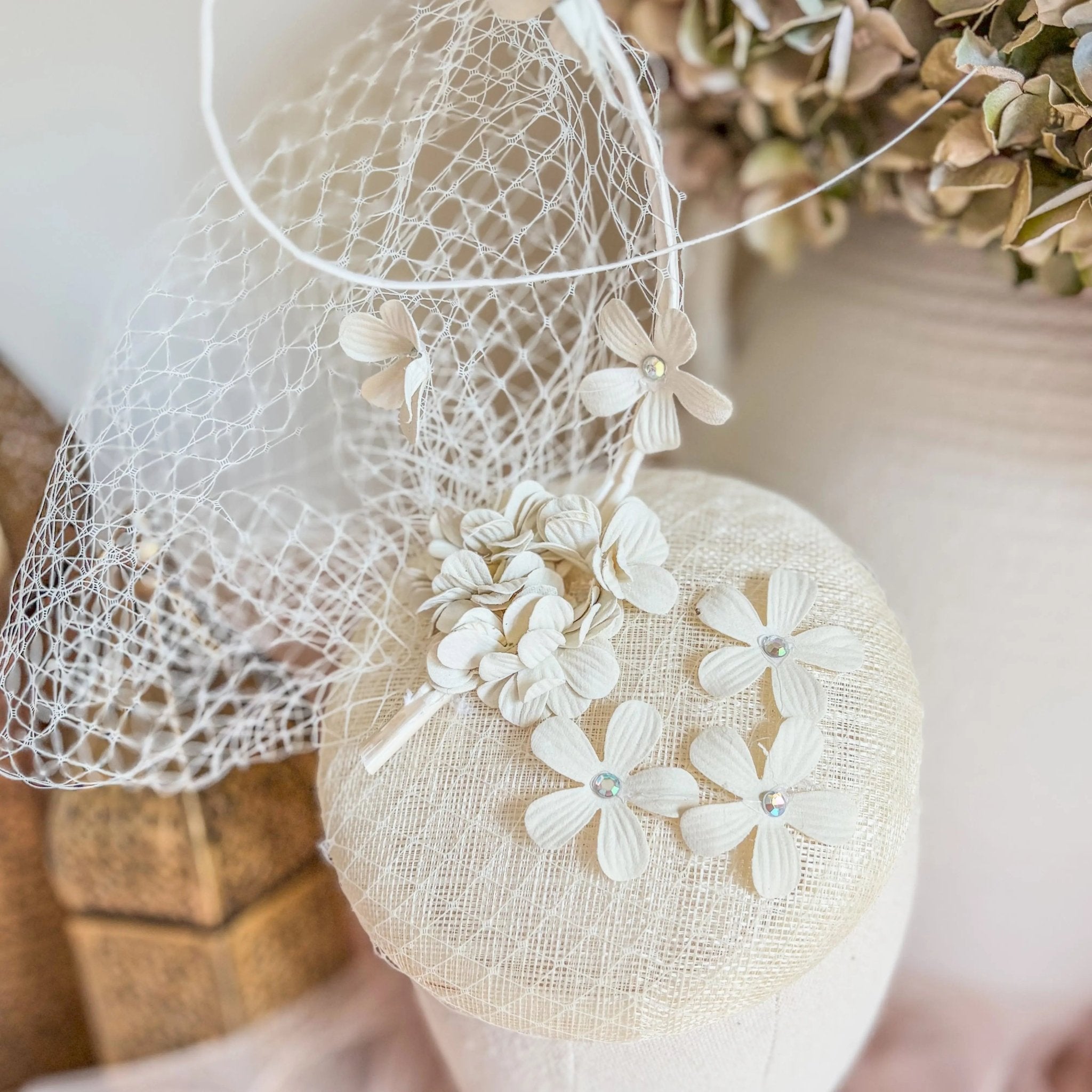 Cream flower fascinator hat - House of Hats