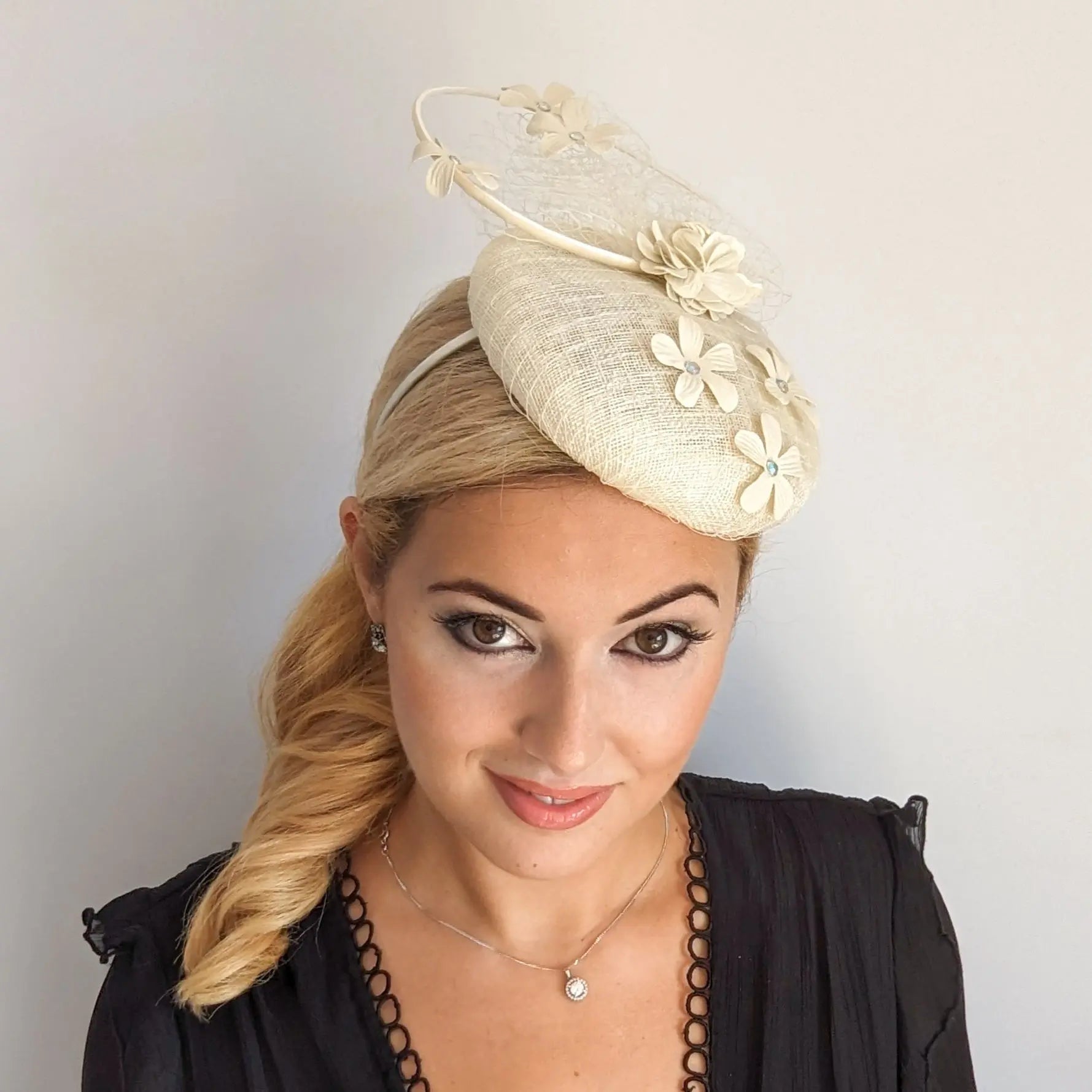 Cream flower fascinator hat - House of Hats