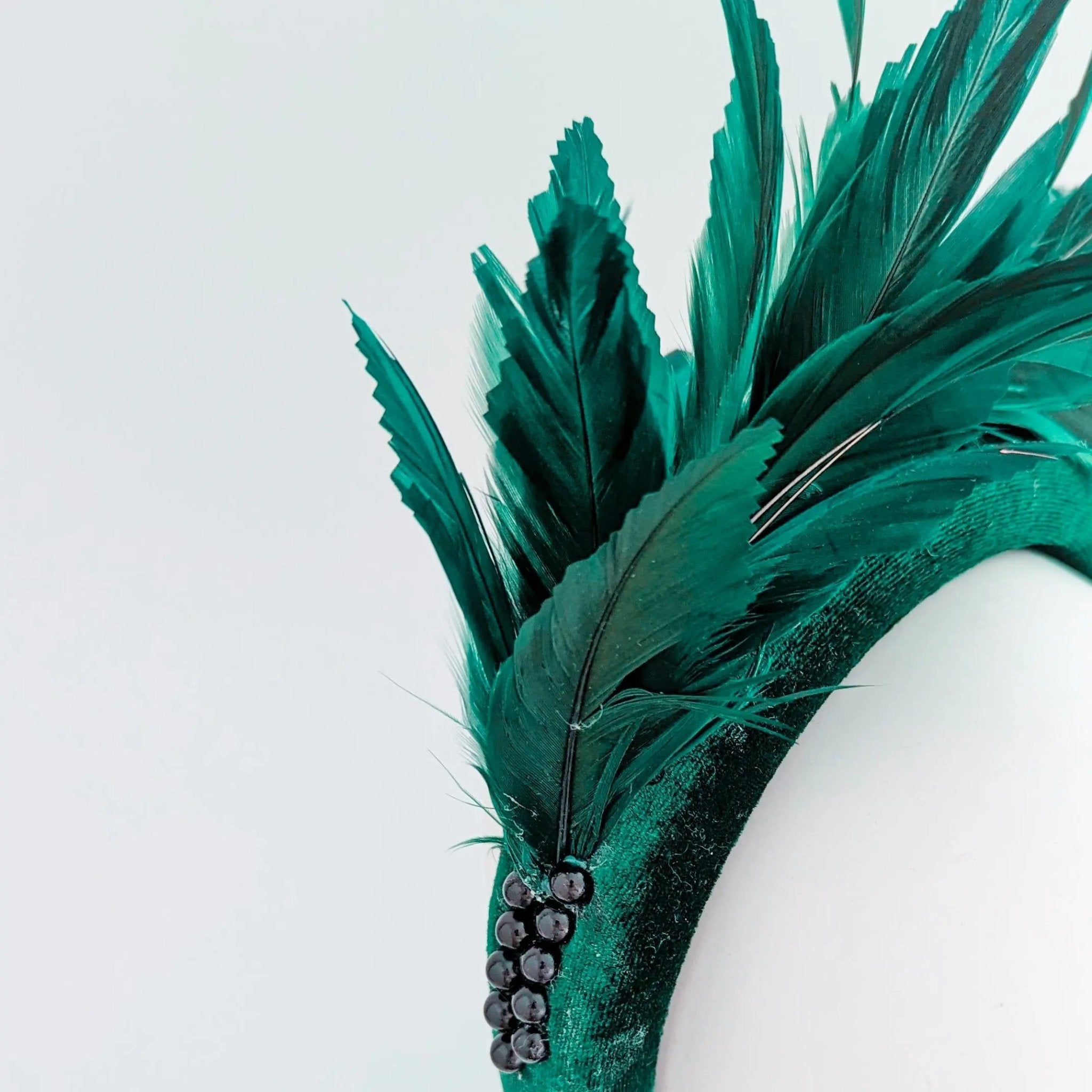 Dark emerald green feather padded velvet headband fascinator - House of Hats