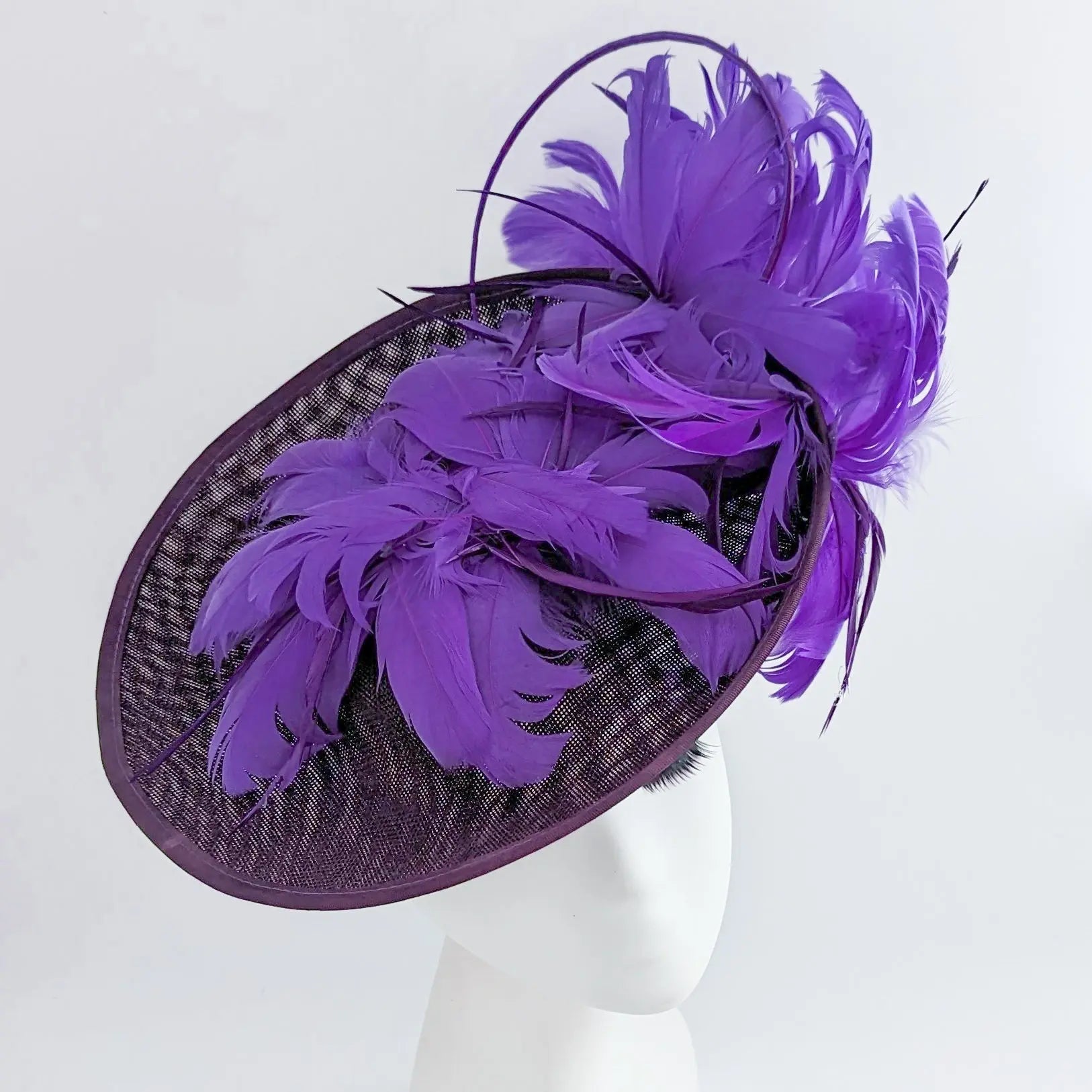 Dark plum cadbury purple large feather saucer disc fascinator hat - House of Hats