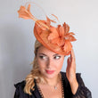 Dusty terracotta orange feather disc fascinator hat - House of Hats