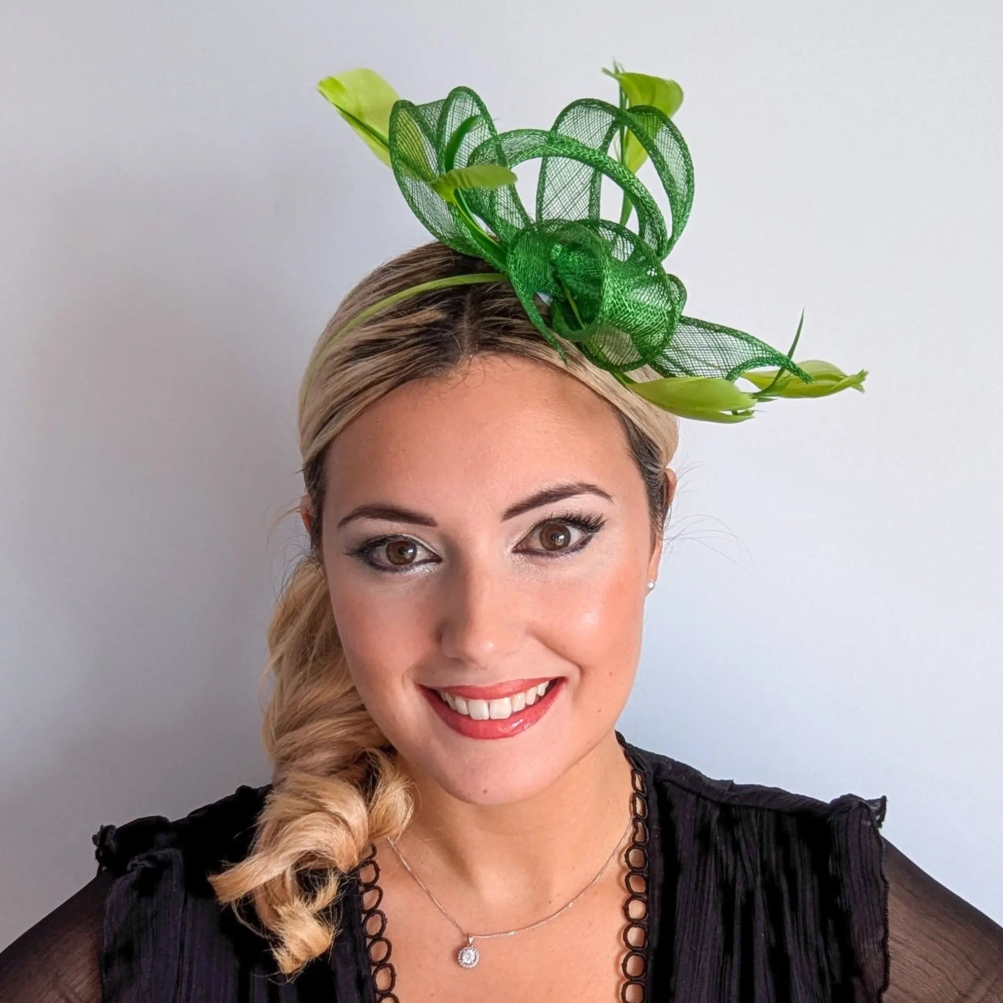 Green feather fascinator hat - House of Hats