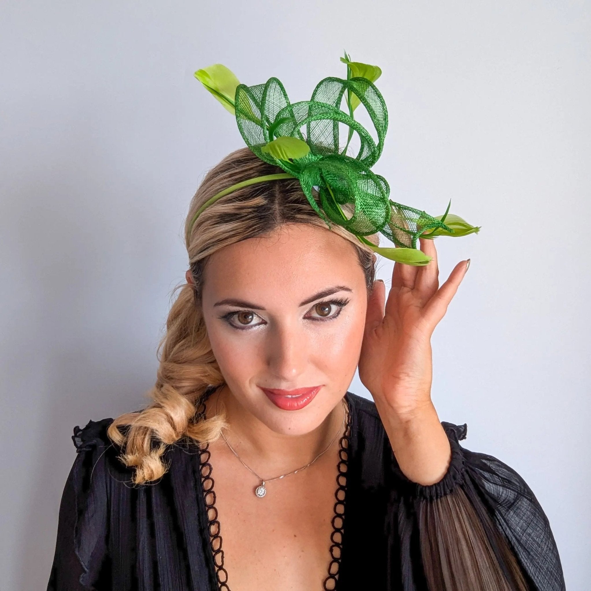 Green feather fascinator hat - House of Hats