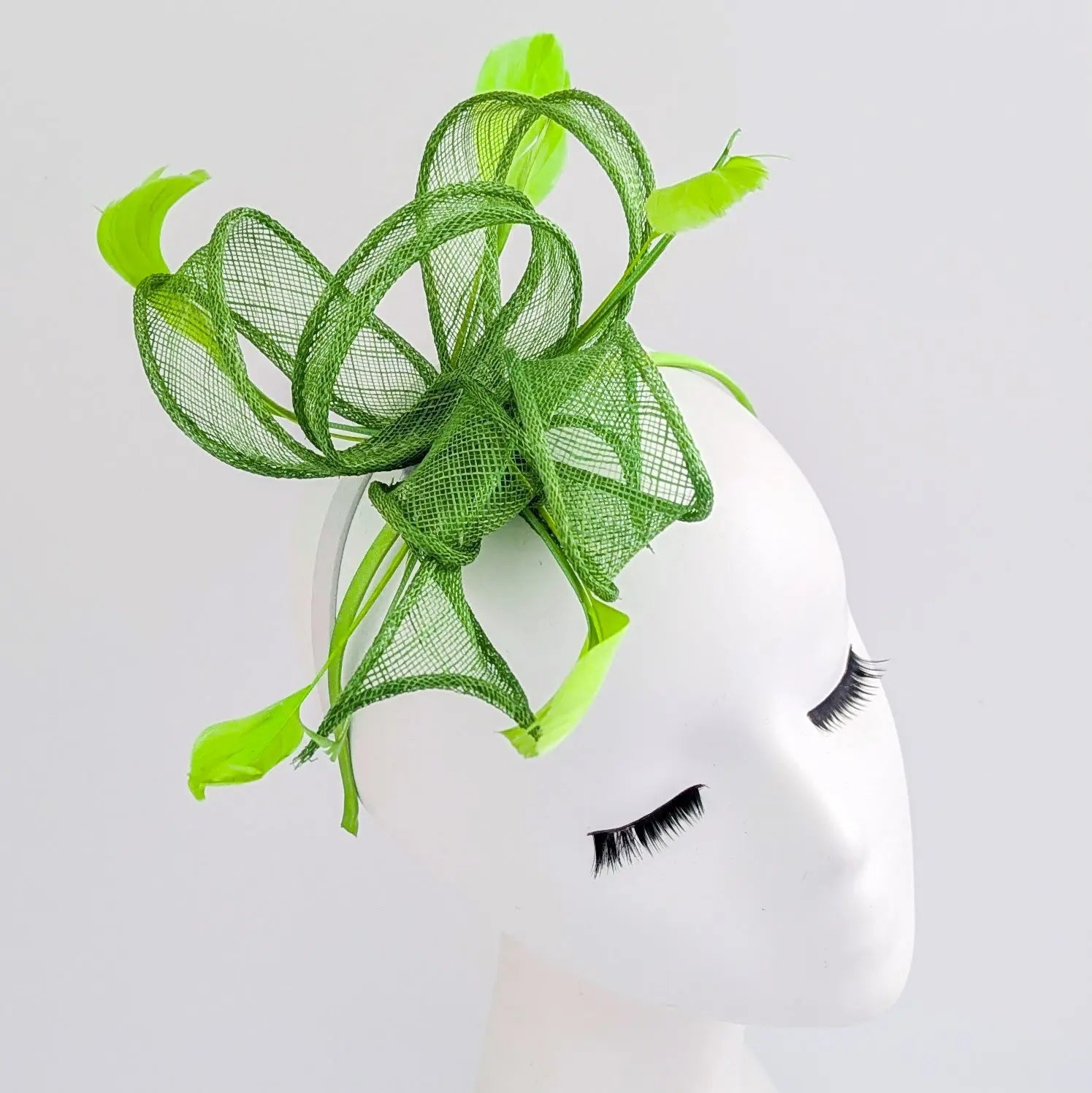 Green feather fascinator hat - House of Hats