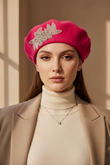 Model wearing a hot pink crystal wool felt French beret hat