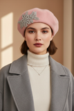 Model wearing a light pink crystal wool felt French beret hat