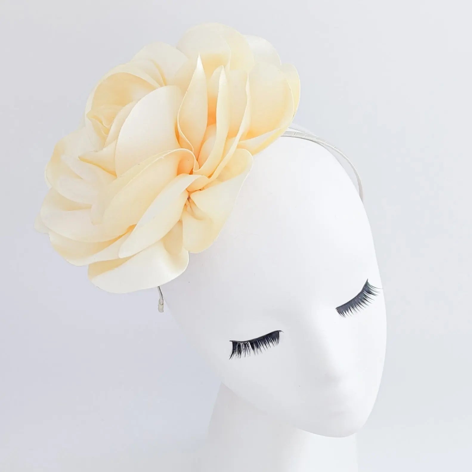Large cream satin rose fascinator hat - House of Hats