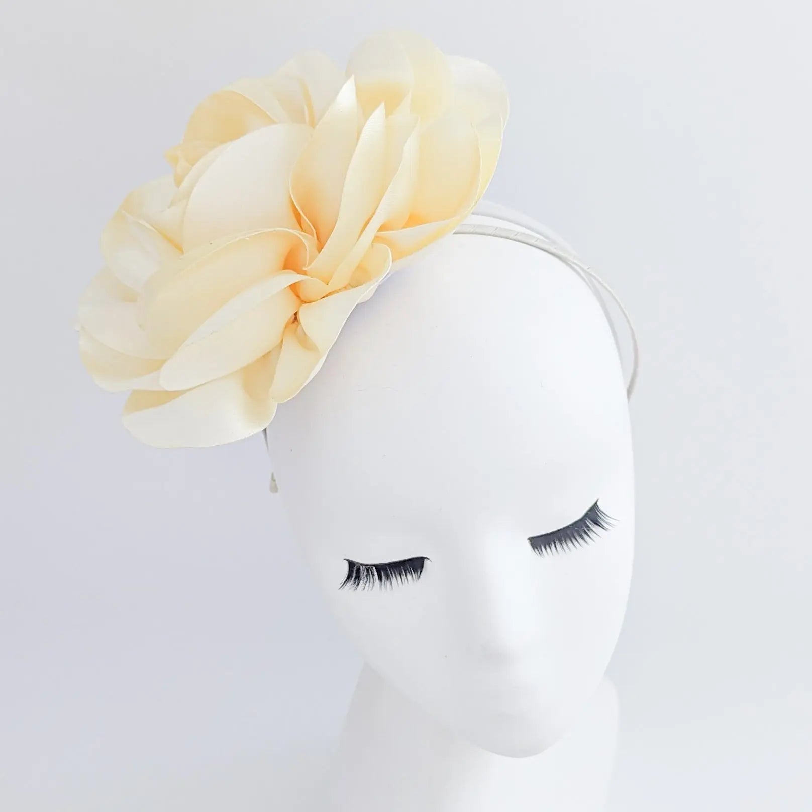 Large cream satin rose fascinator hat - House of Hats