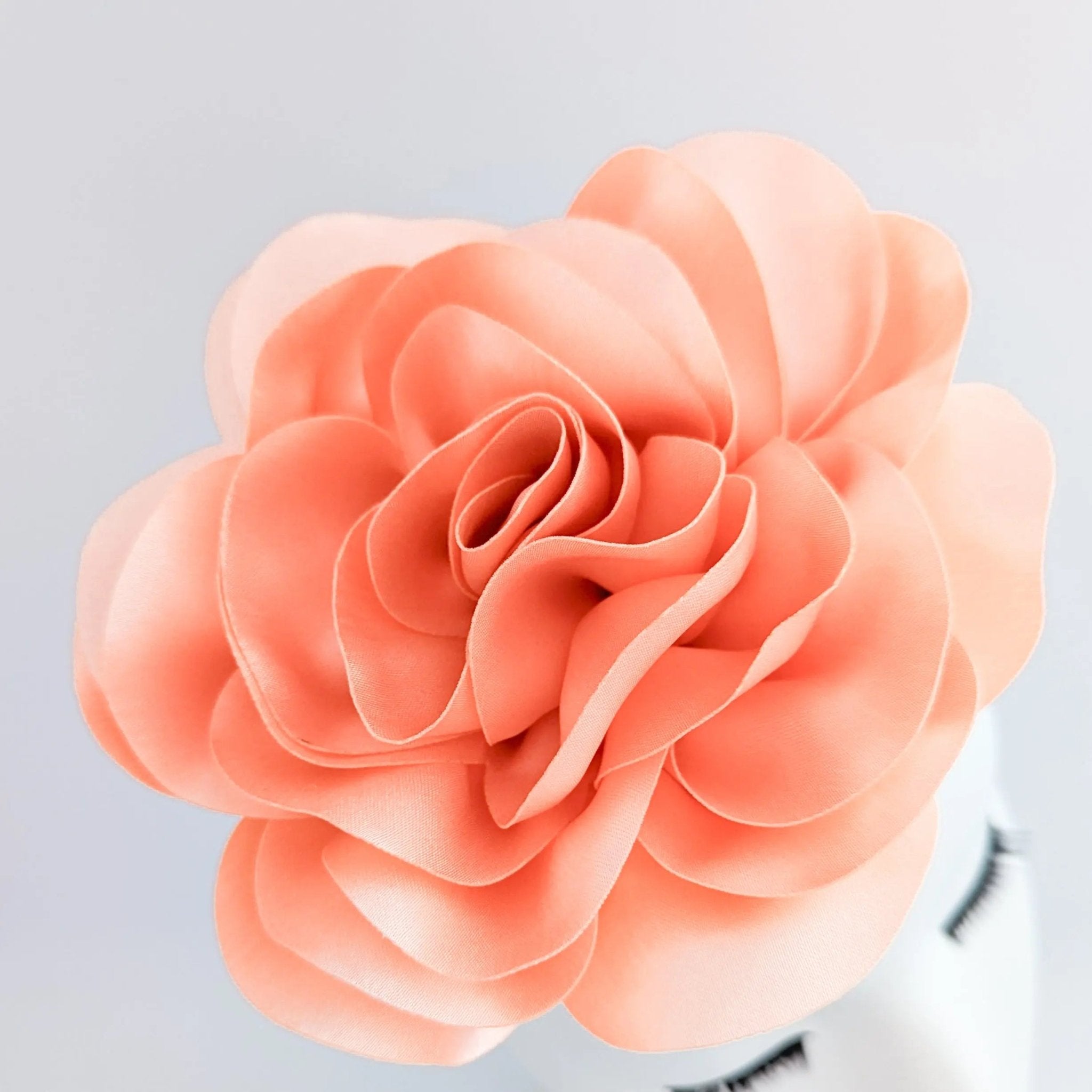 Large peach satin rose fascinator hat - House of Hats