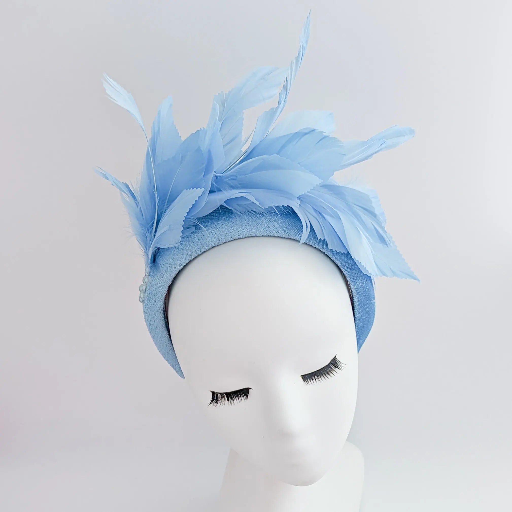 Light cornflower blue feather padded velvet headband fascinator - House of Hats