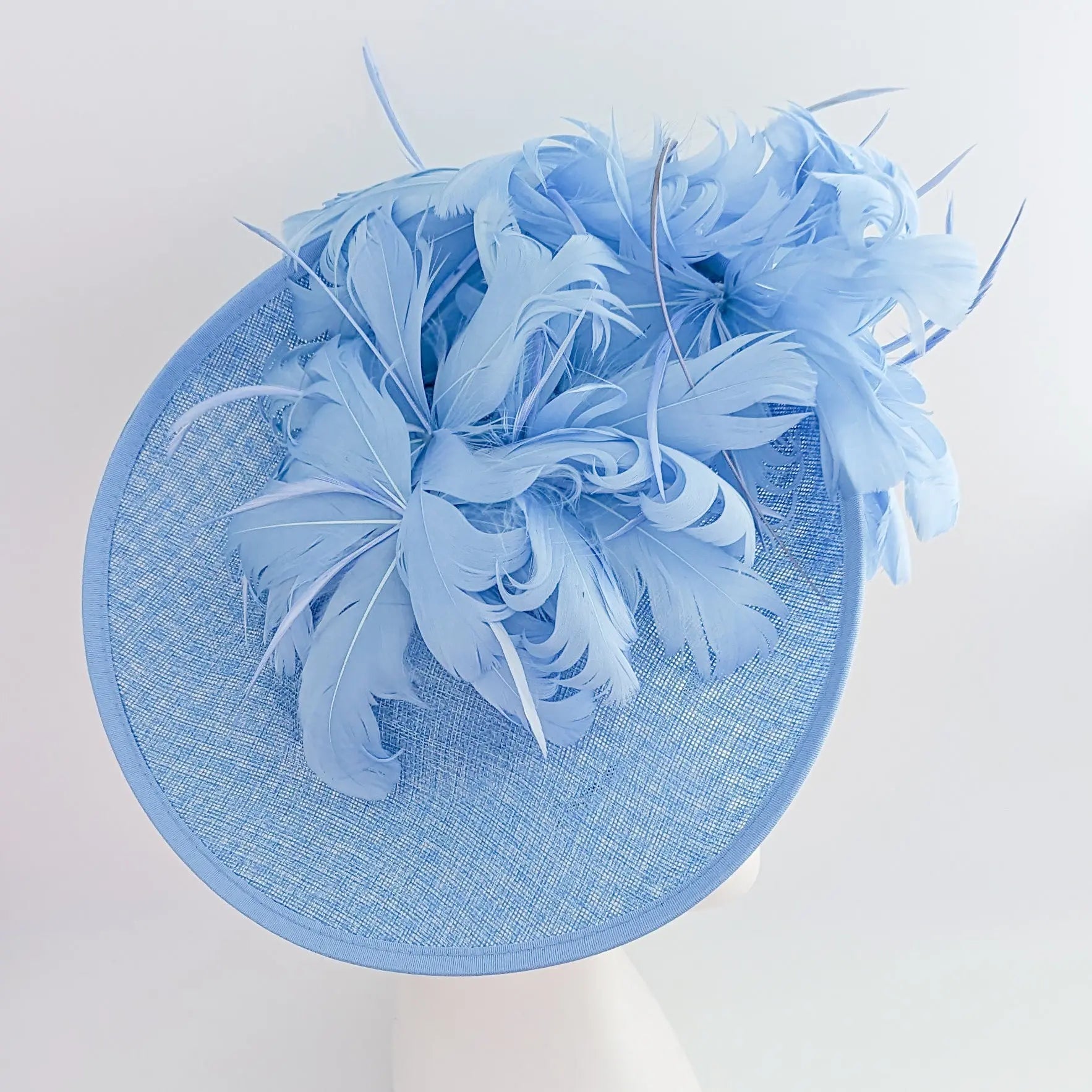 Light cornflower blue large feather saucer disc fascinator hat - House of Hats