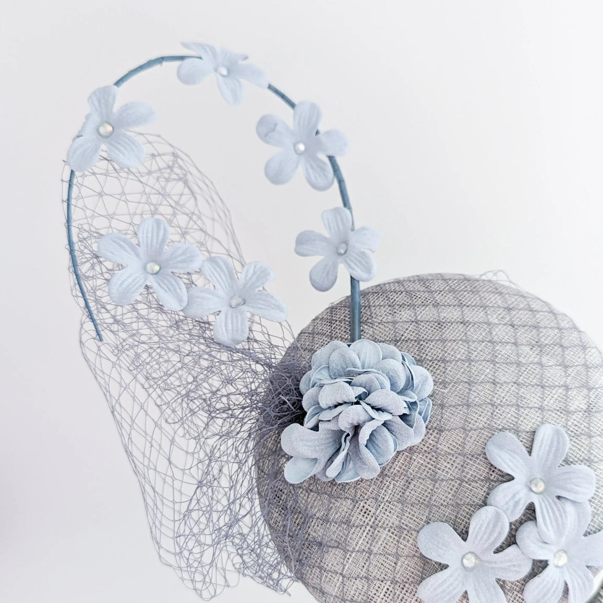 Light dusty blue flower fascinator hat - House of Hats