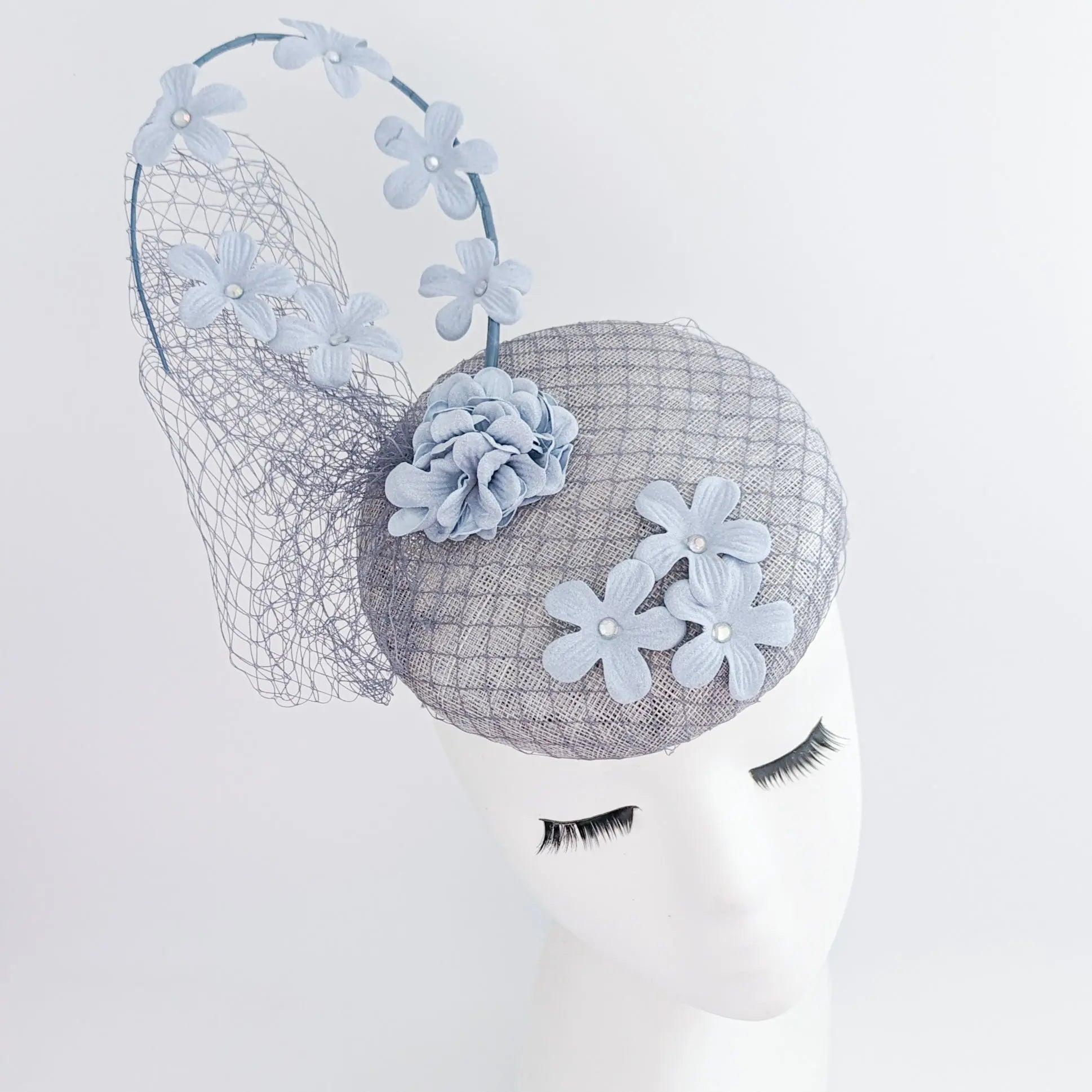 Light dusty blue flower fascinator hat - House of Hats