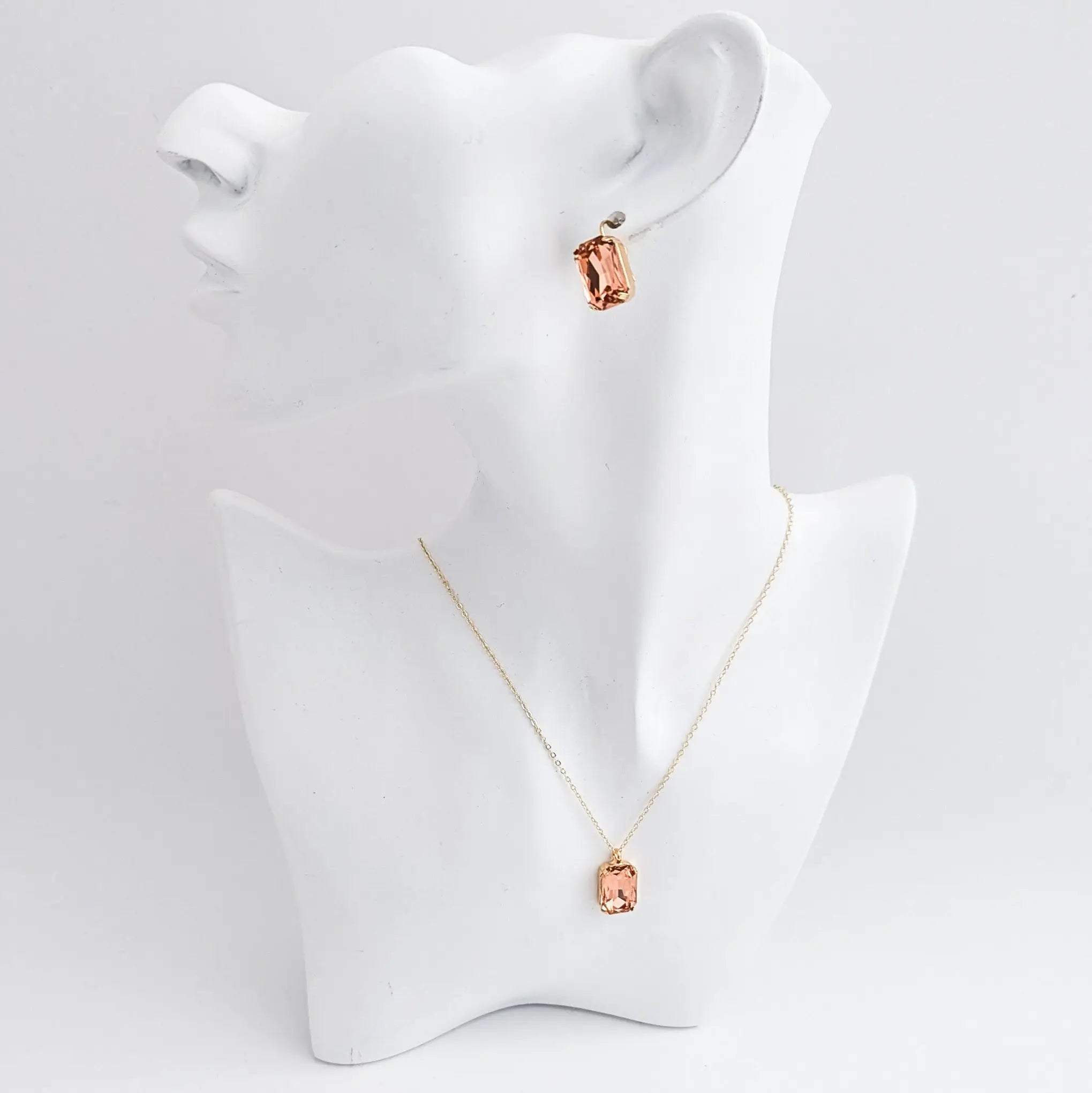Light peach crystal gold emerald cut necklace - House of Hats