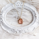 Light peach crystal gold emerald cut necklace - House of Hats