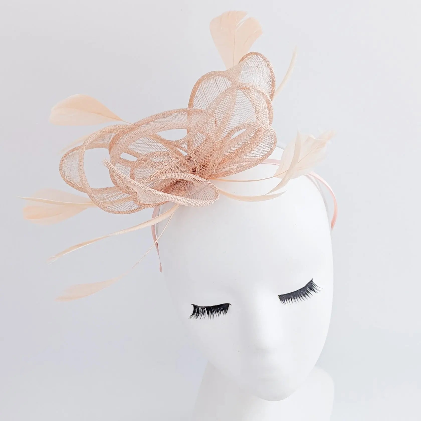 Light peach pink feather fascinator hat - House of Hats
