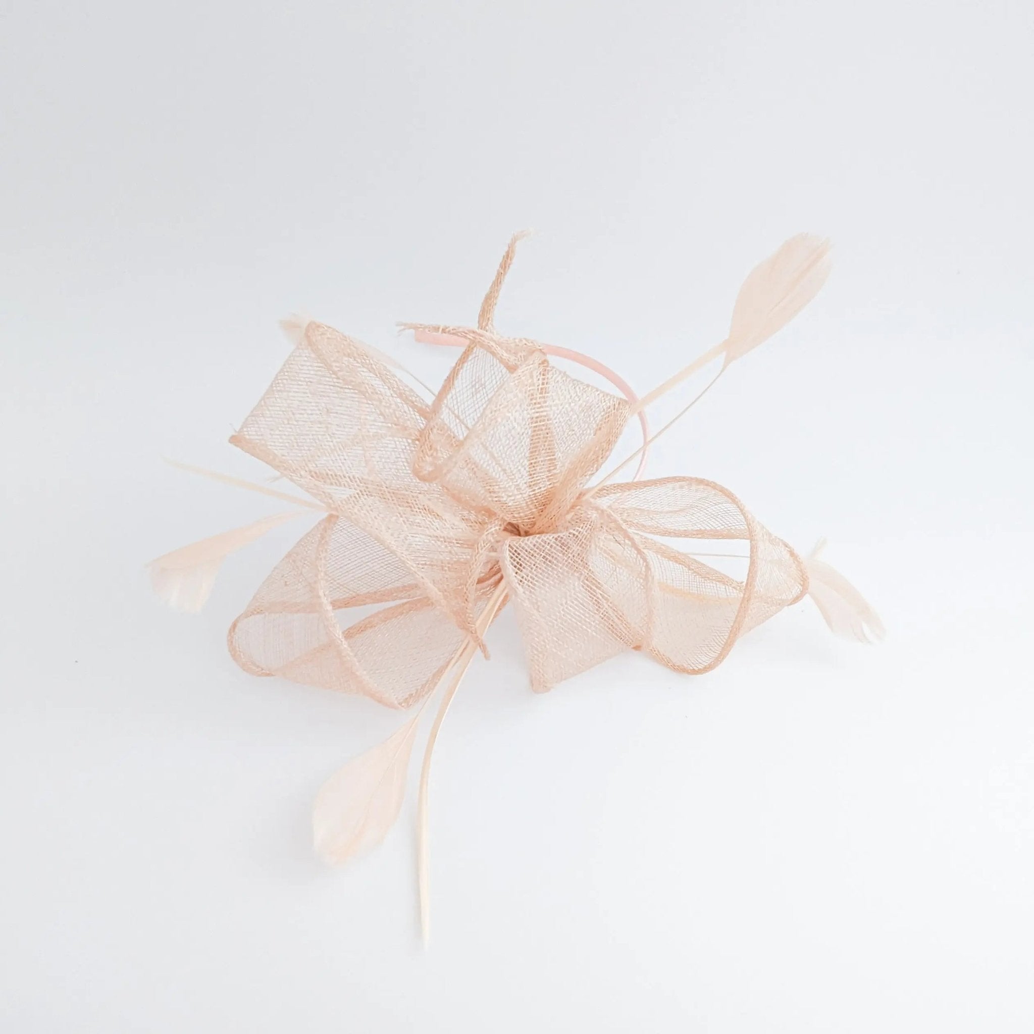 Light peach pink feather fascinator hat - House of Hats