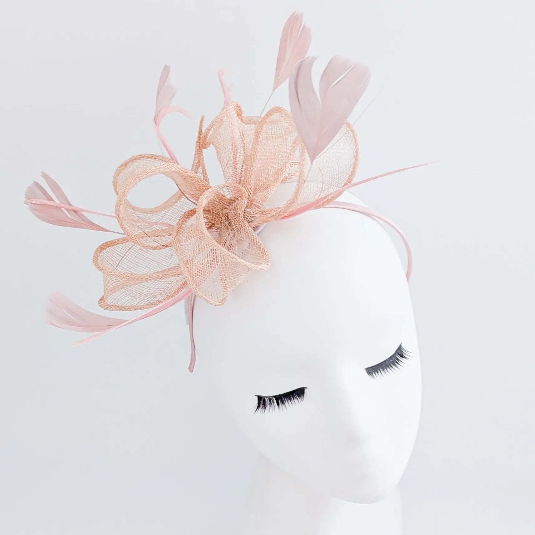 Light peach pink feather fascinator hat - House of Hats