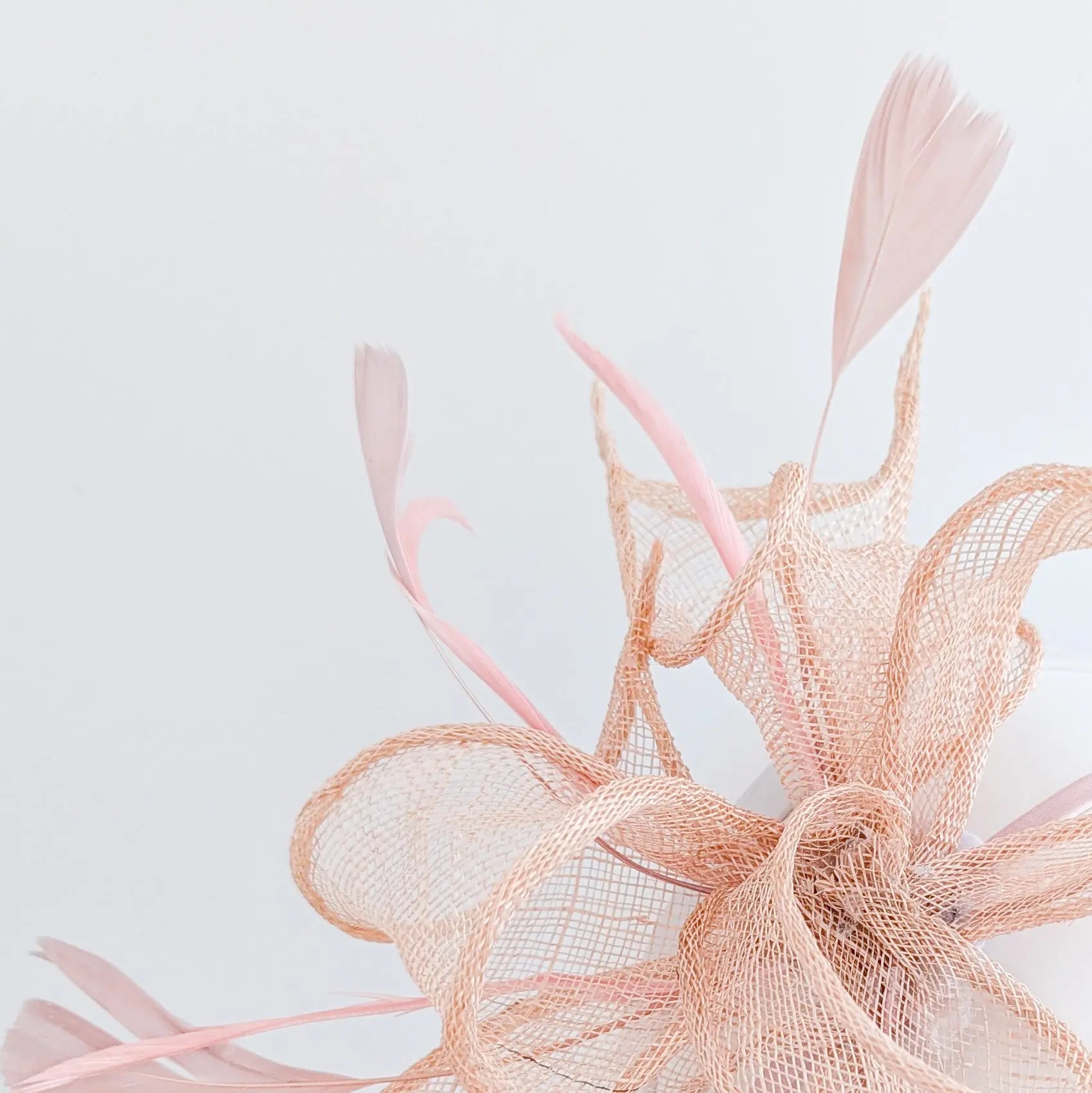 Light peach pink feather fascinator hat - House of Hats