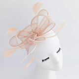 Light peach pink feather fascinator hat - House of Hats