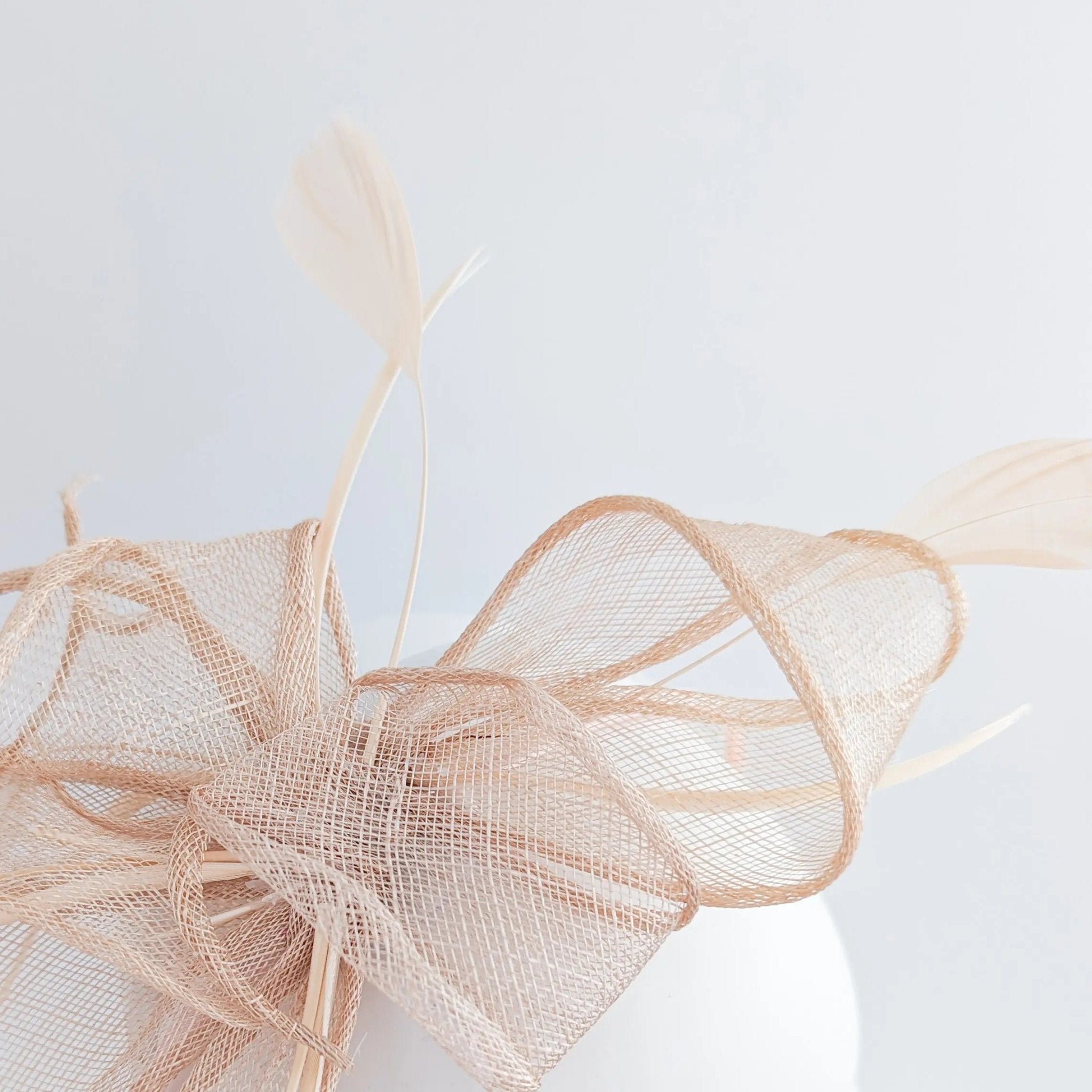 Light peach pink feather fascinator hat - House of Hats