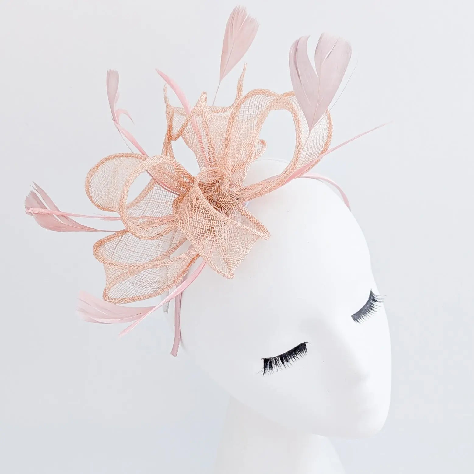 Light peach pink feather fascinator hat - House of Hats