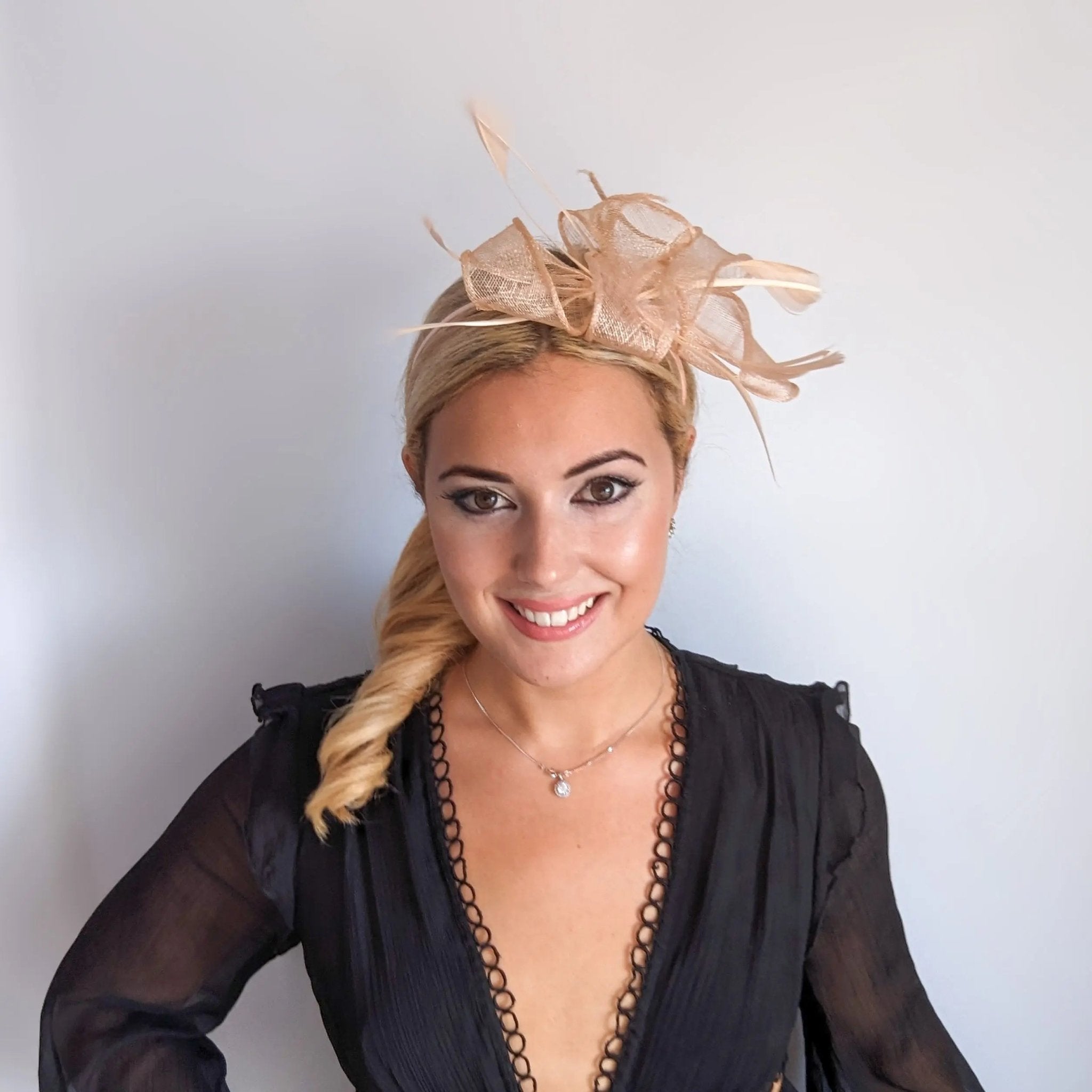 Light peach pink feather fascinator hat - House of Hats
