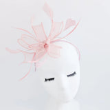Light pink feather fascinator hat - House of Hats