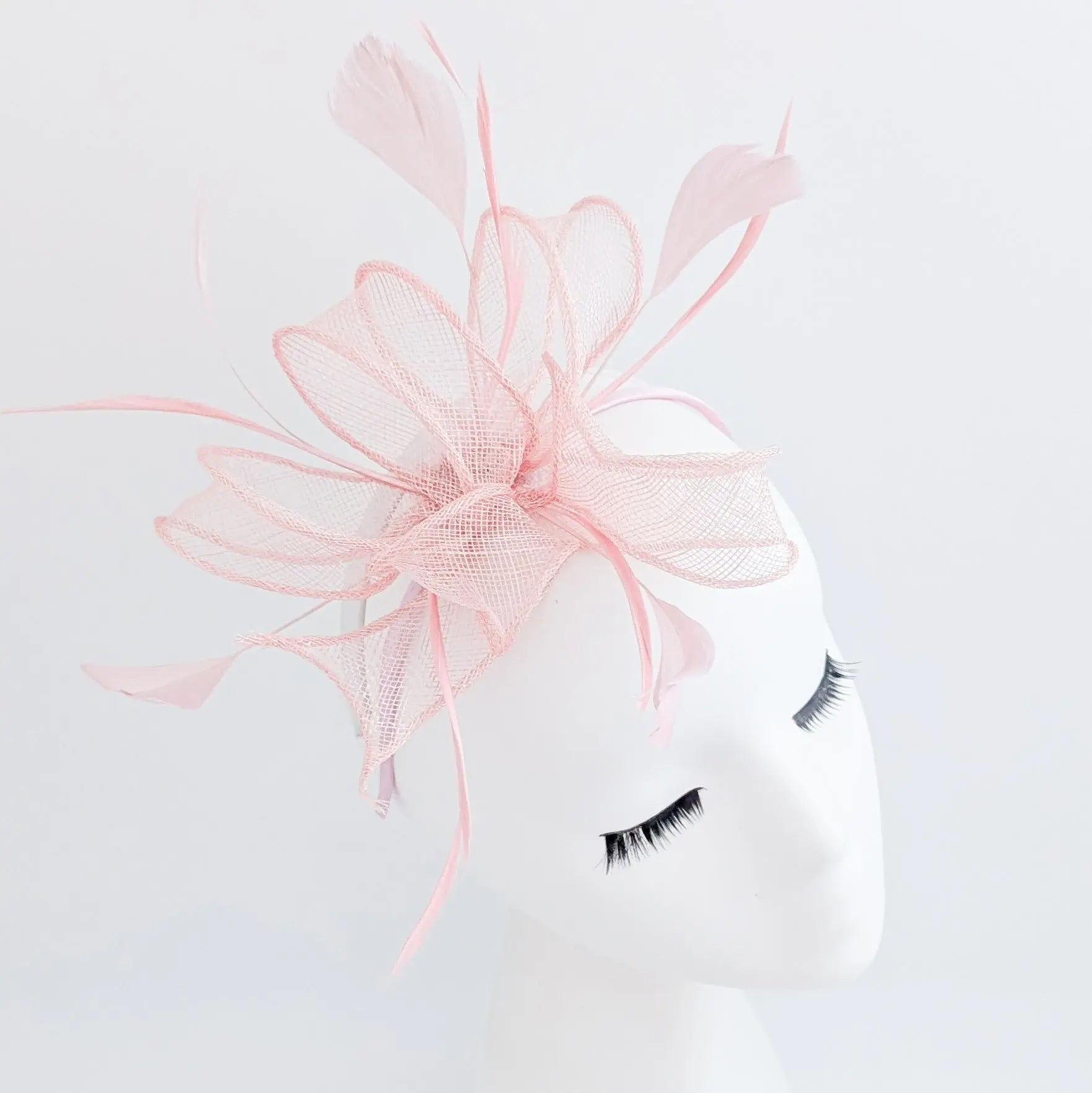 Light pink feather fascinator hat - House of Hats