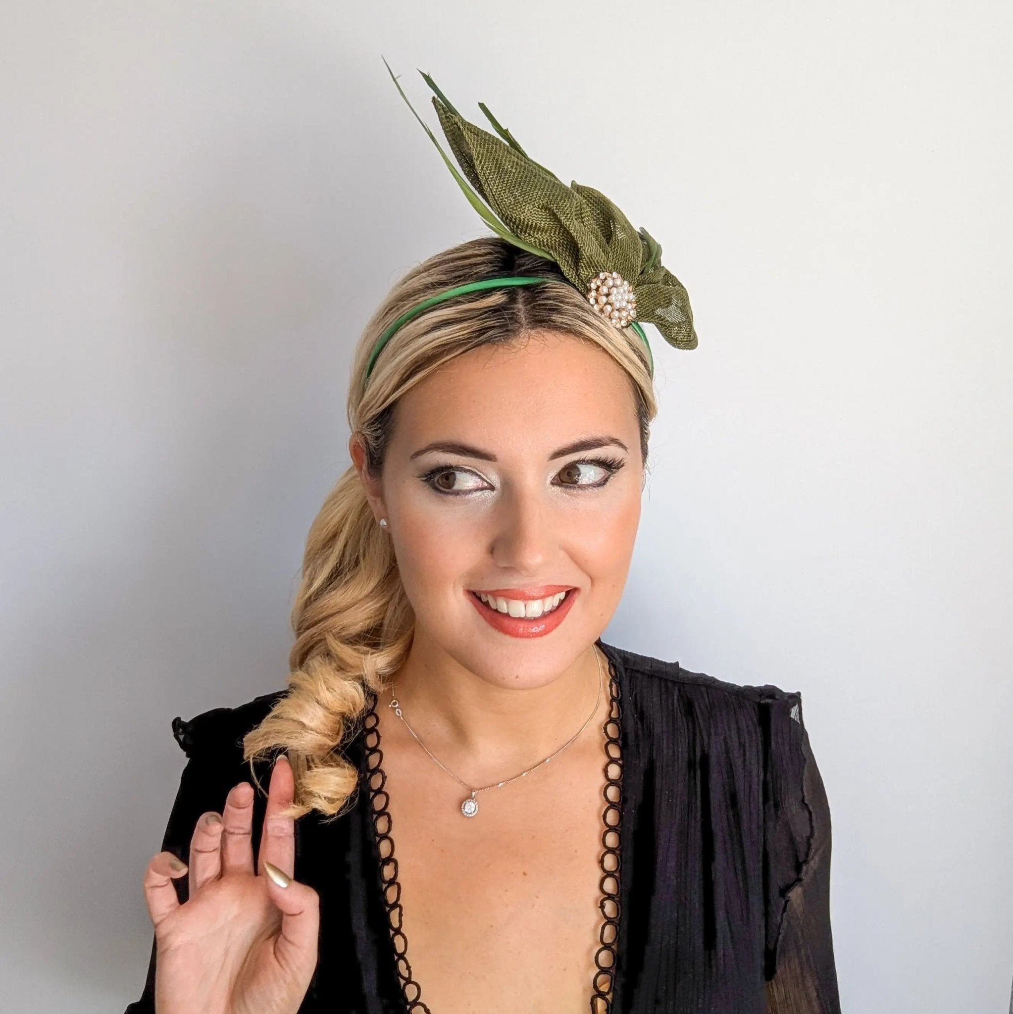 Moss green feather petal fan fascinator hat - House of Hats